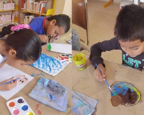 Niños pintando en los talleres.